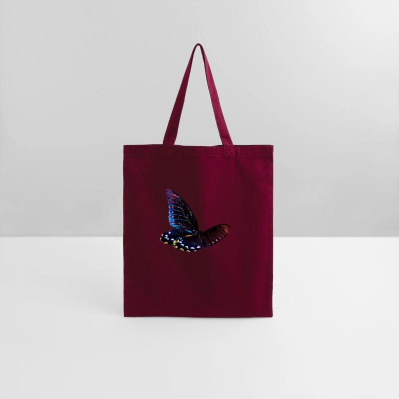 Black and blue butterfly in motion