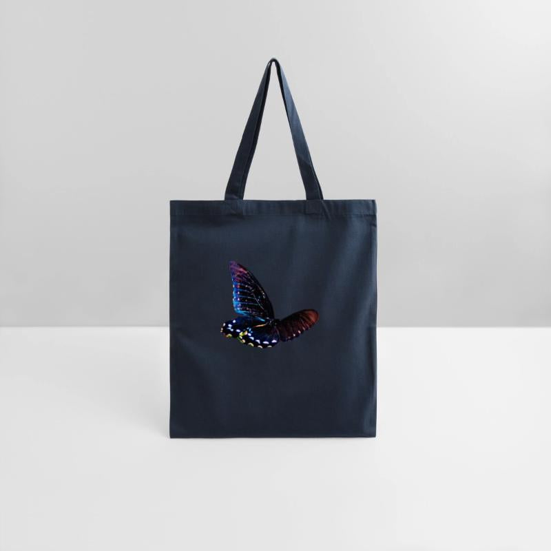 Black and blue butterfly in motion