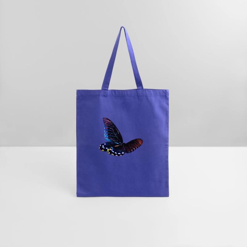 Black and blue butterfly in motion
