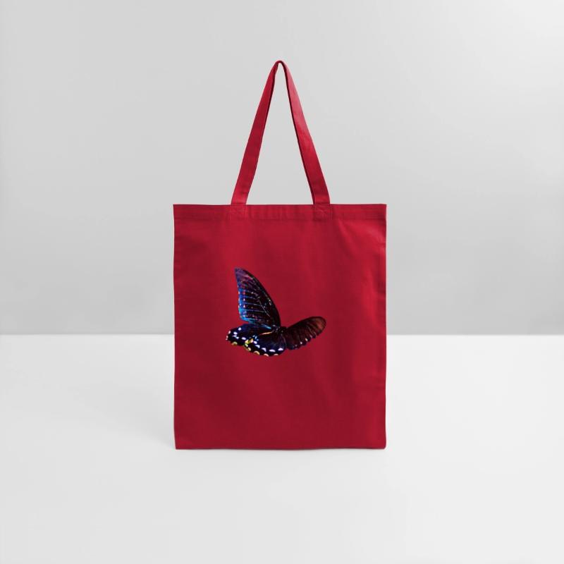 Black and blue butterfly in motion